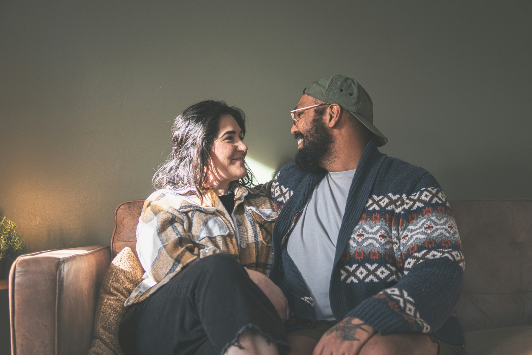 Couple cuddling and laughing