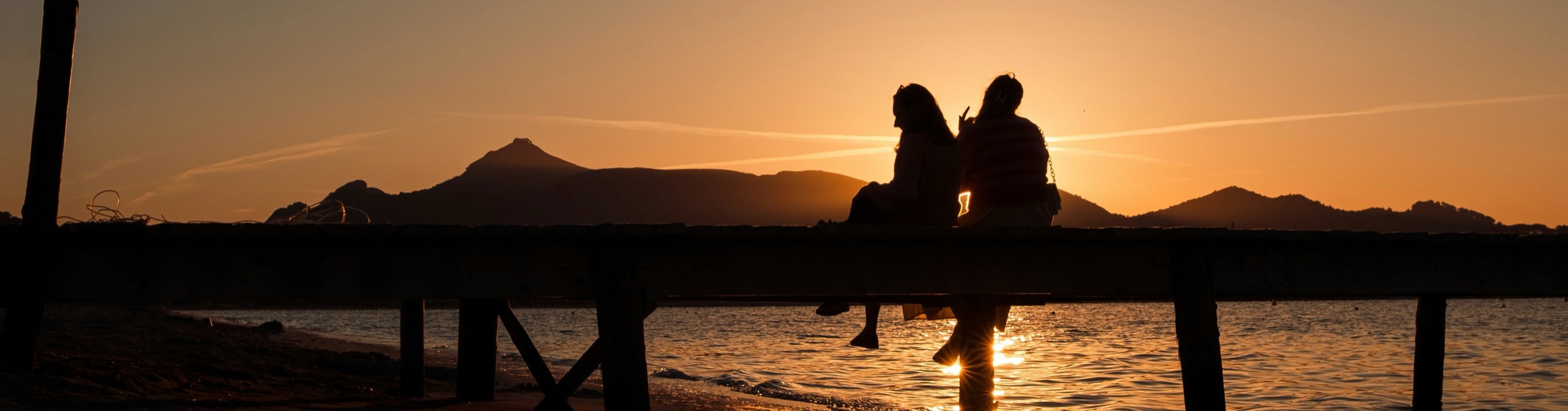 two people on pier